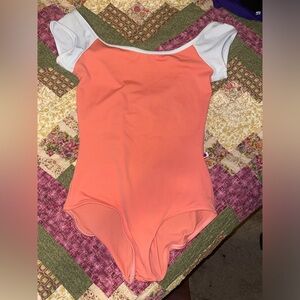 Yumiko. Orange/coral L Leo